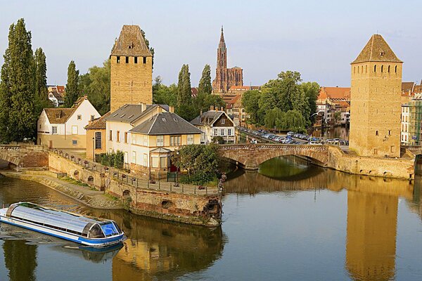 Ancient brick towers on the river bank