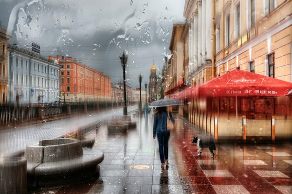 Dziewczyna pod parasolem na nabrzeżu Sankt Petersburga