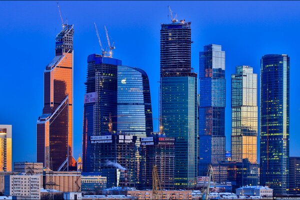 Winter Moscow city on the background of a blue evening