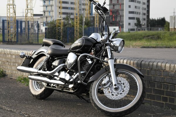 Yamaha motorcycle on the background of residential homes