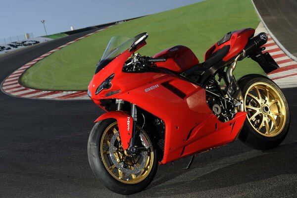 Red superbike on the race track