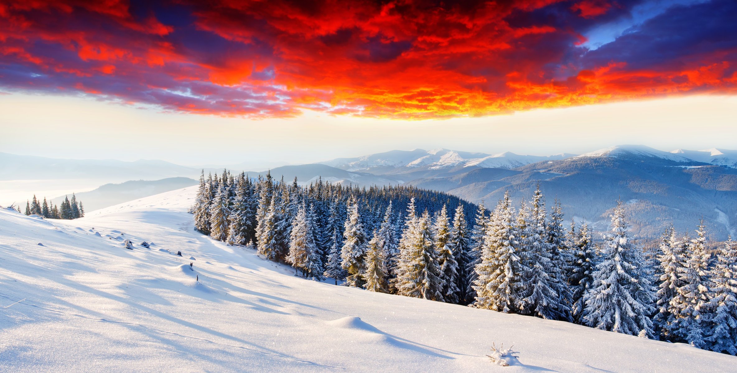 glow mountains winter dawn snow