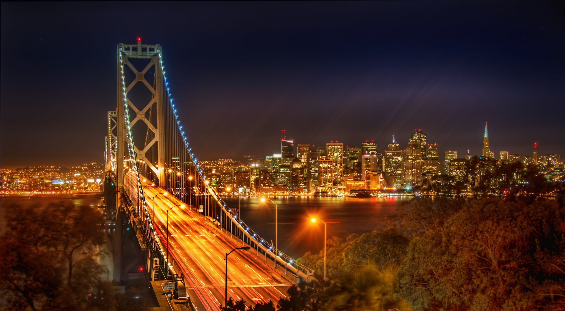 town photo views buildings architecture bridge night light