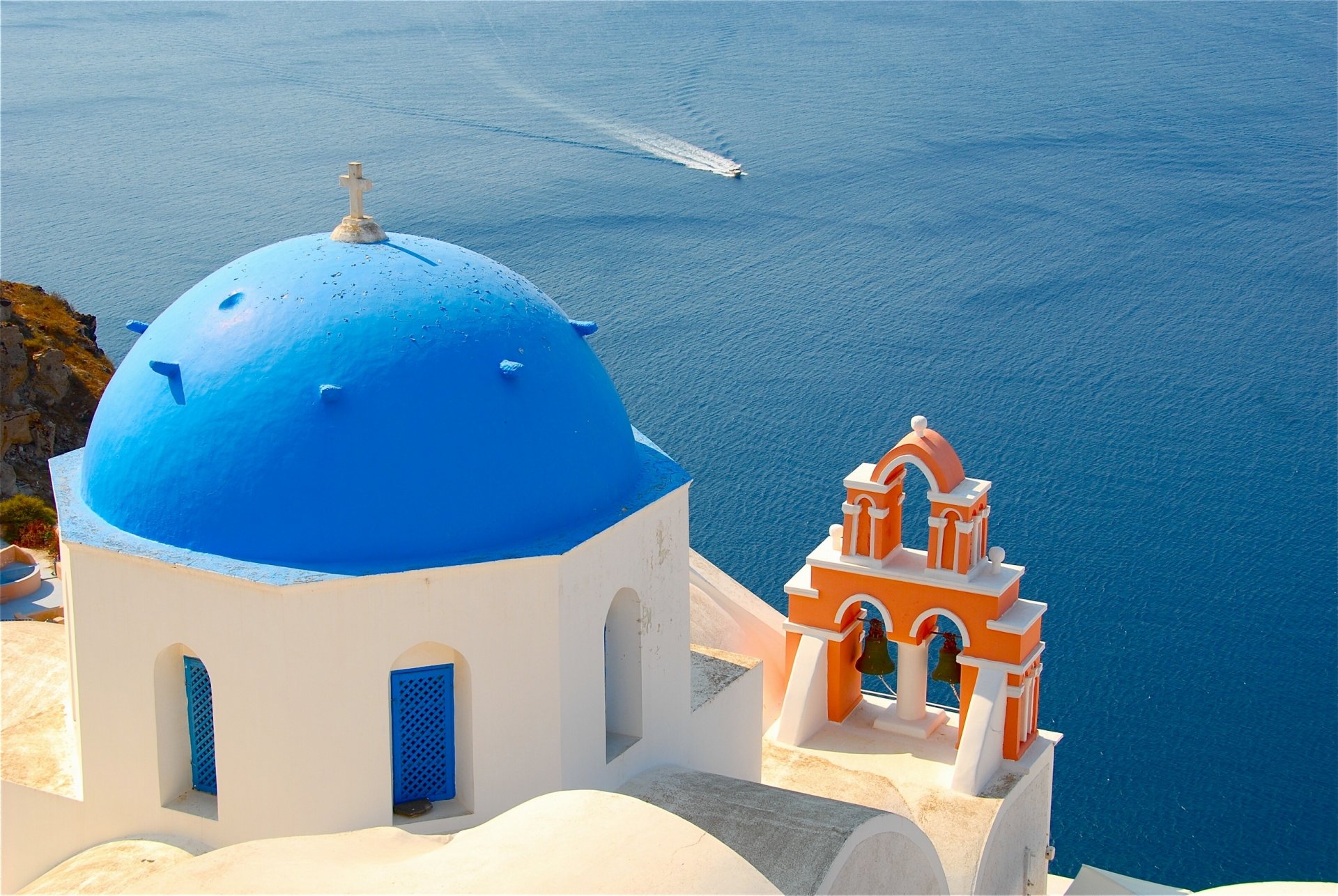 oia santorini greece aegean sea church dome bell water surface