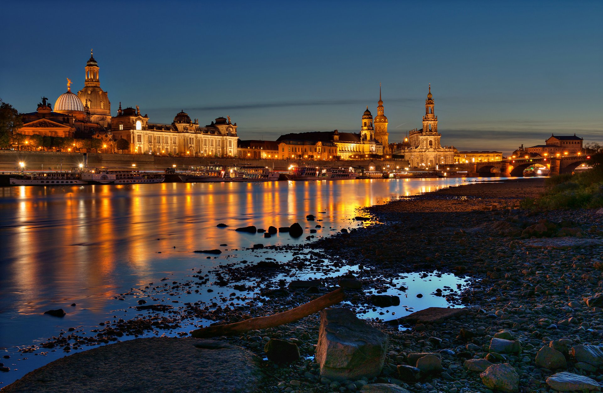 dresden germany city houses buildings river elbe night shore stones lights bridge boat