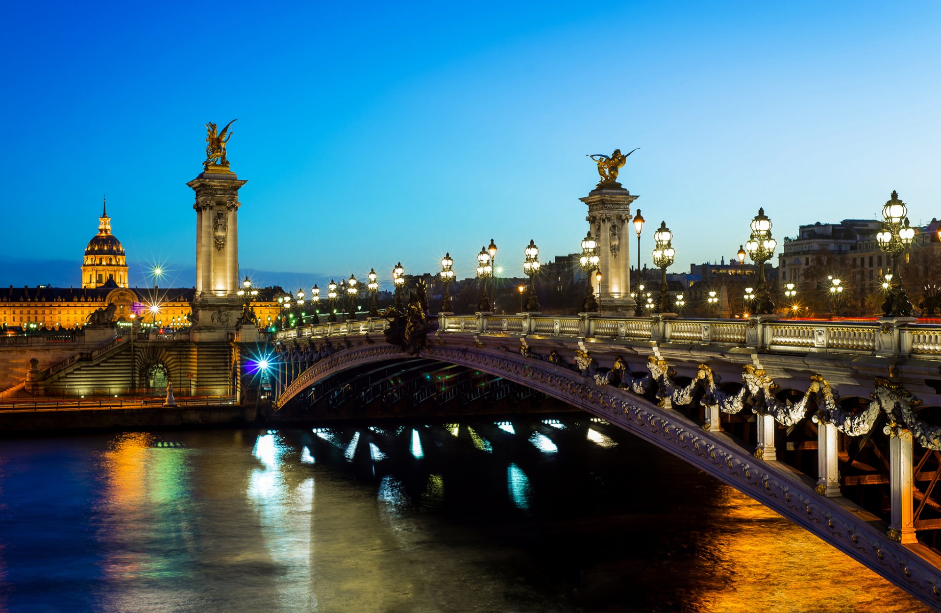 paris france alexander iii bridge river seine city evening lanterns lighting light bridge architecture