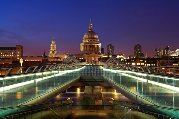England, London. View of St. Paul s Cathedral at night. The Millennium Bridge in the UK