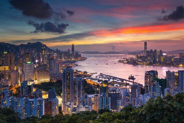 Hong Kong on the background of sunset with sea view
