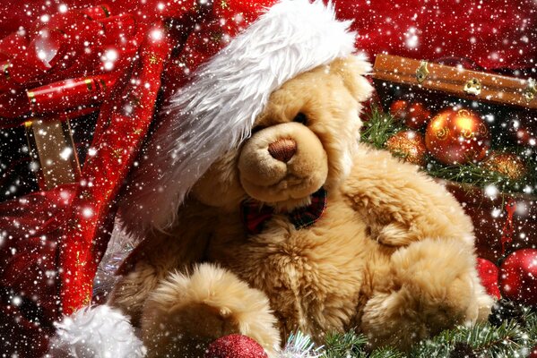 Cute teddy bear in a Christmas hat