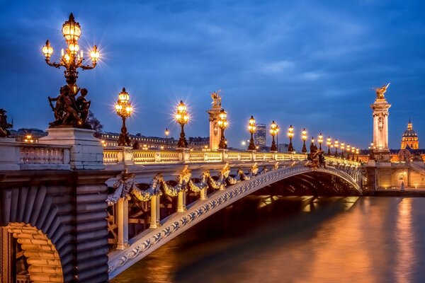 Bridge with lanterns in Paris on the Seine
