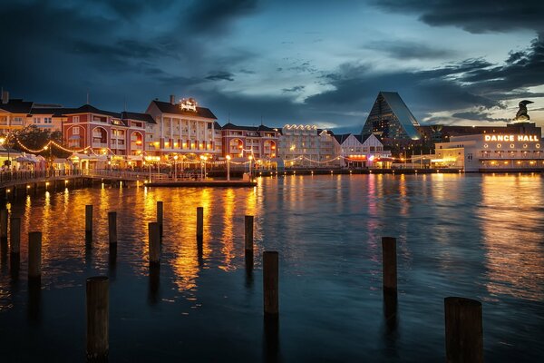 Night city with reflection of lights in the water