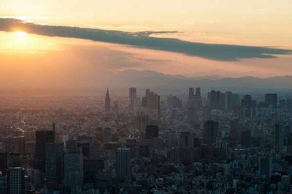 Tokyo coucher de soleil gratte-ciel bâtiment