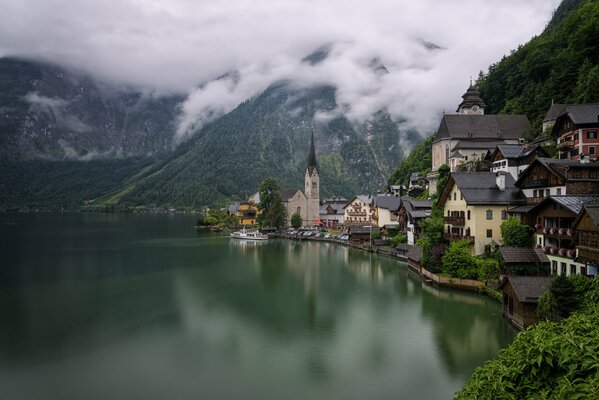 Austrian houses surrounded by forest mountains