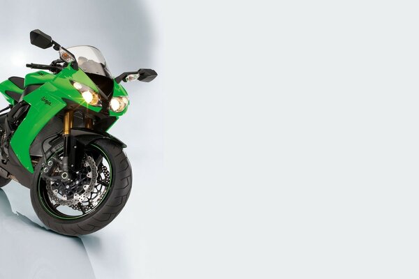 Green sports motorcycle with headlights