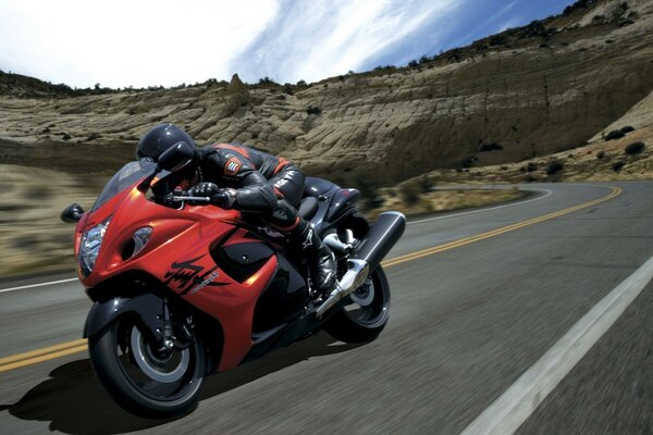 Biker on a sports bike in the canyon