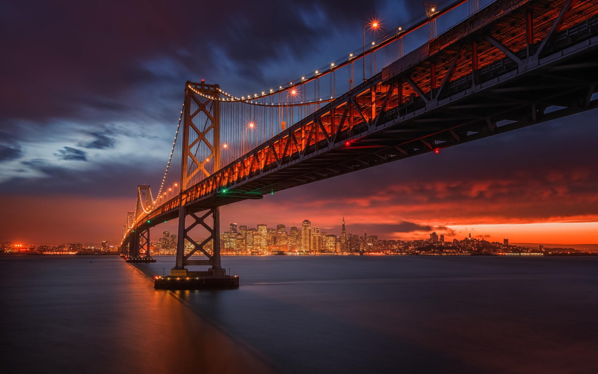 bay bridge san francisco kalifornia san francisco zatoka san francisco most miasto nocy zachód słońca