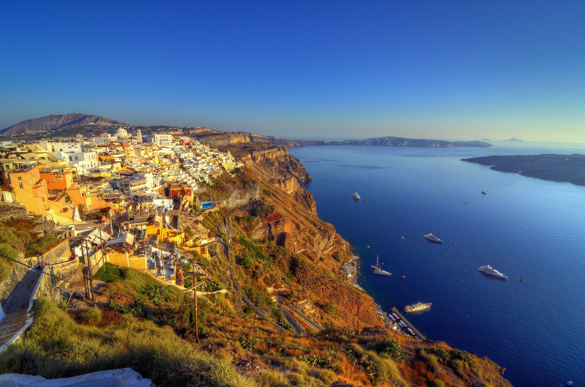 greece santorini city town houses architecture mountains rocks landscape sea yachts