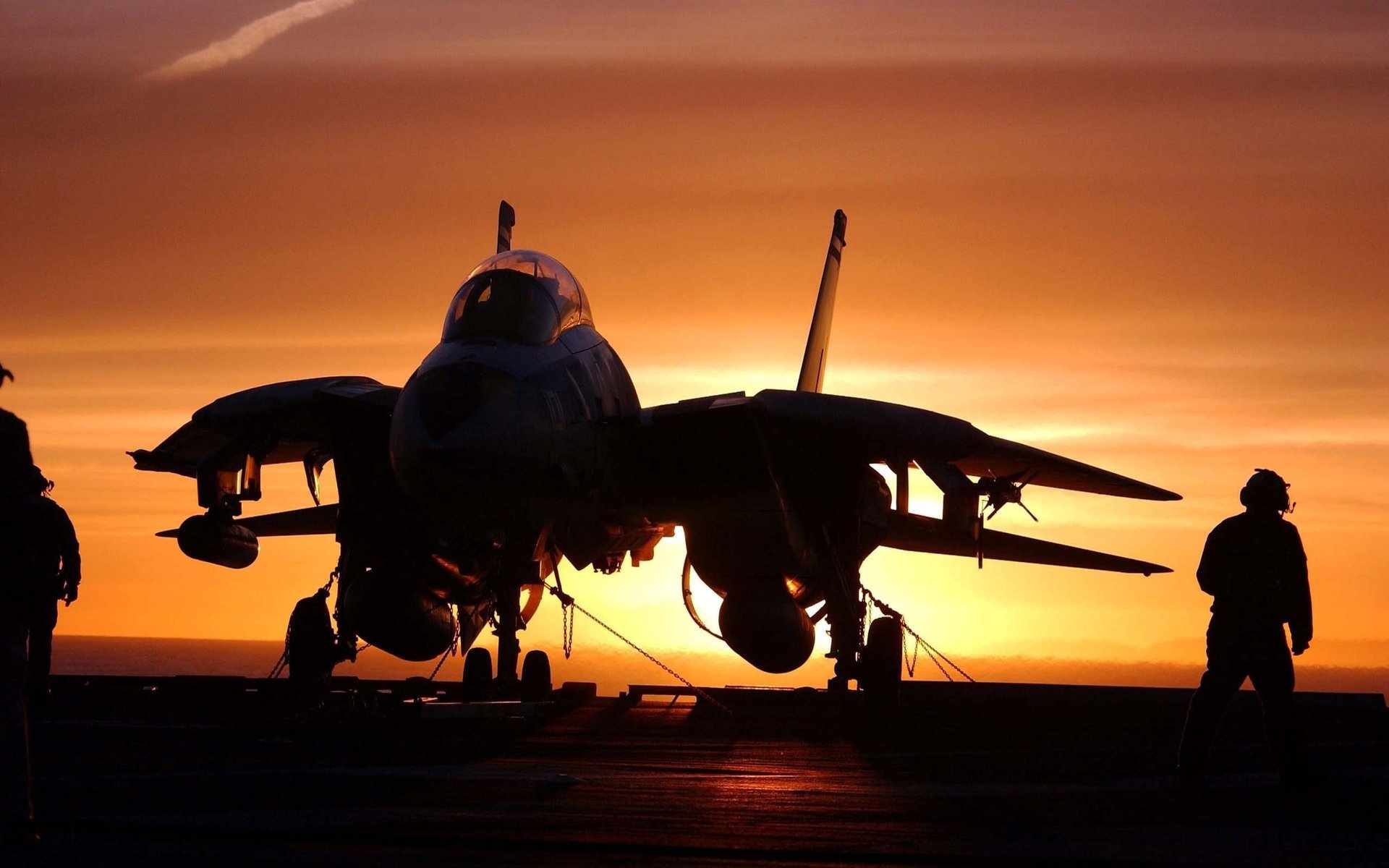 the ocean the carrier the plane sunset