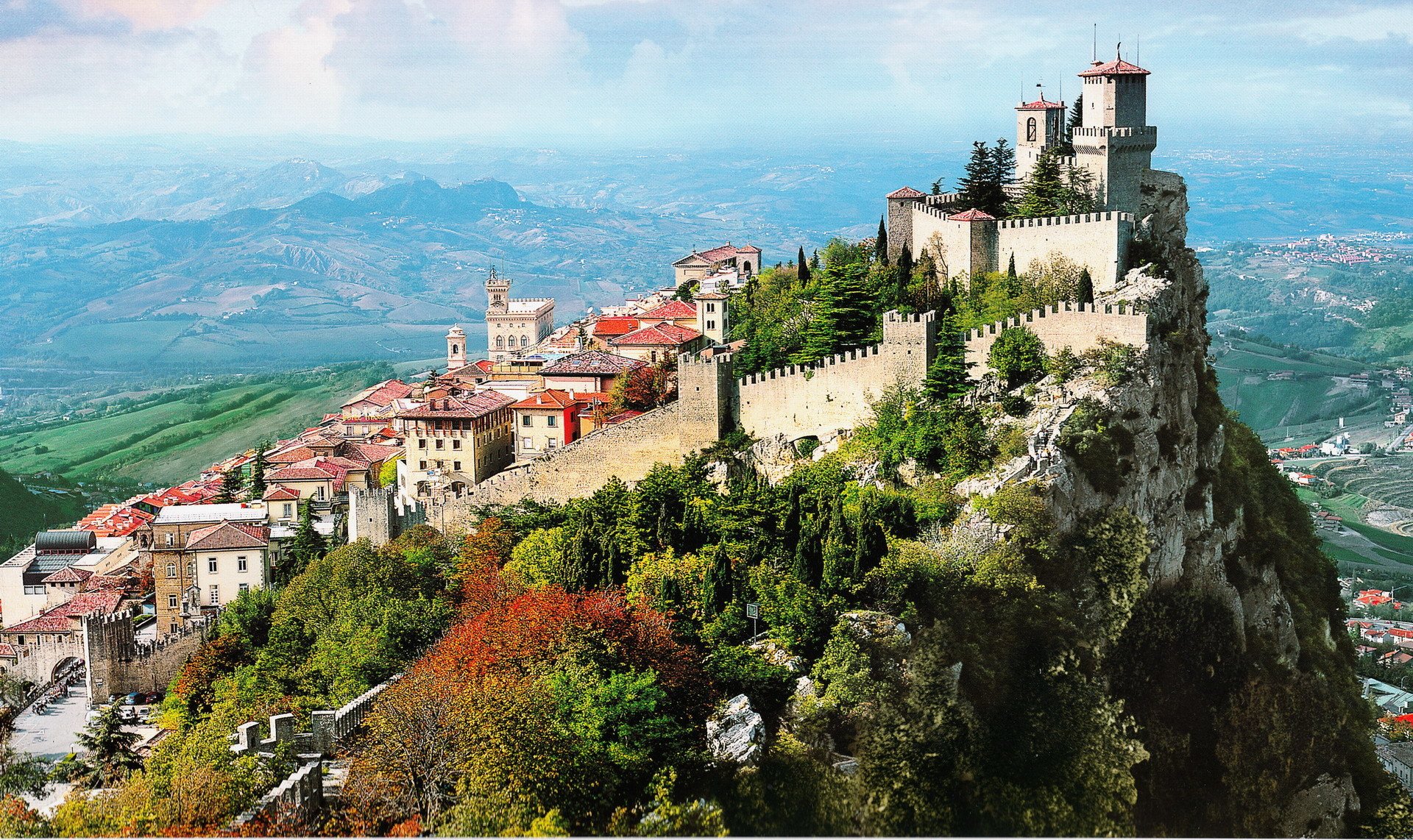 italy san marino town horizon mountain forest photo