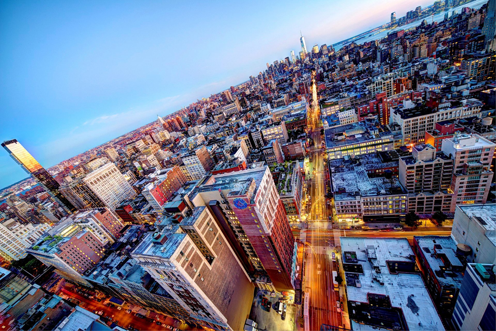 new york stati uniti midtown manhattan chelsea stratus midtown sera grattacieli tetti edifici luci strada città panorama