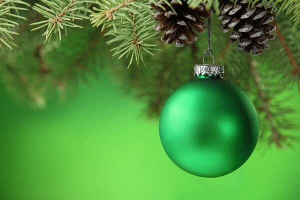 Green Christmas tree toy on the Christmas tree