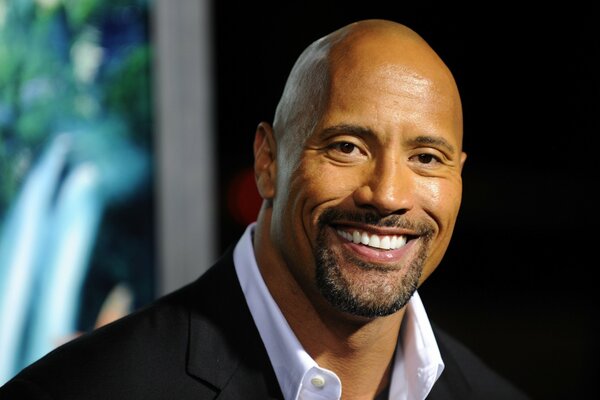 L acteur de Rock Dwayne Johnson sourit