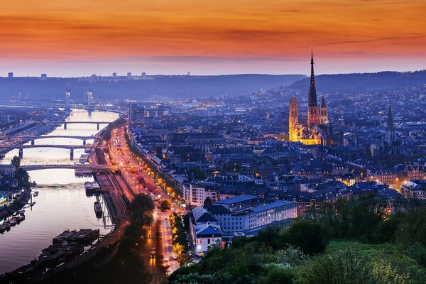 The evening city of France in the evening with lights