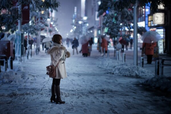 A lonely girl on a city street