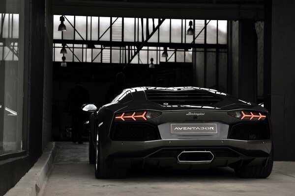 A unique lamborghini aventador in the garage