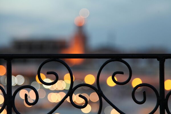 Fence facing the roadway in the evening