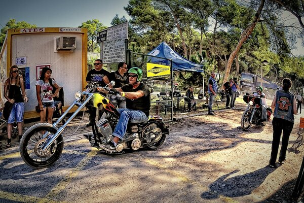 A Spaniard rides a Harley-davidson motorcycle