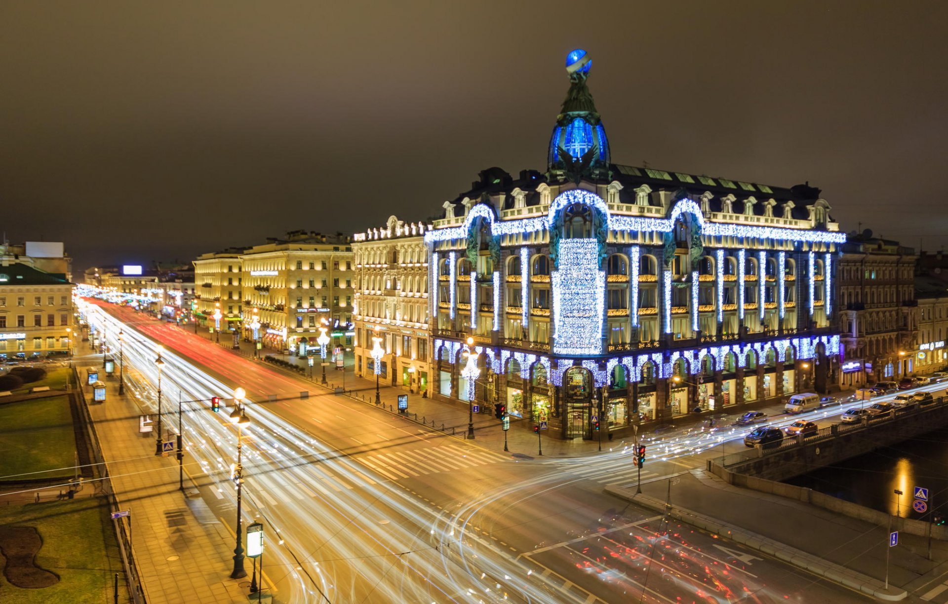 petersburg peter rosja petersburg noc światła domy budynki ulica newski prospekt singer