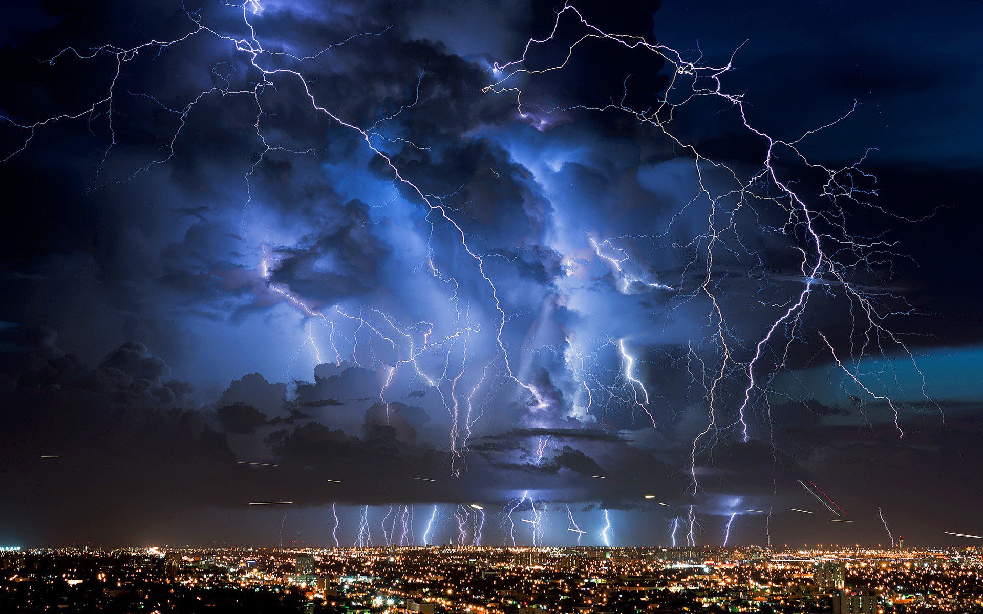 night houses lights sky clouds clouds lightning discharge flashes rain thunderstorm