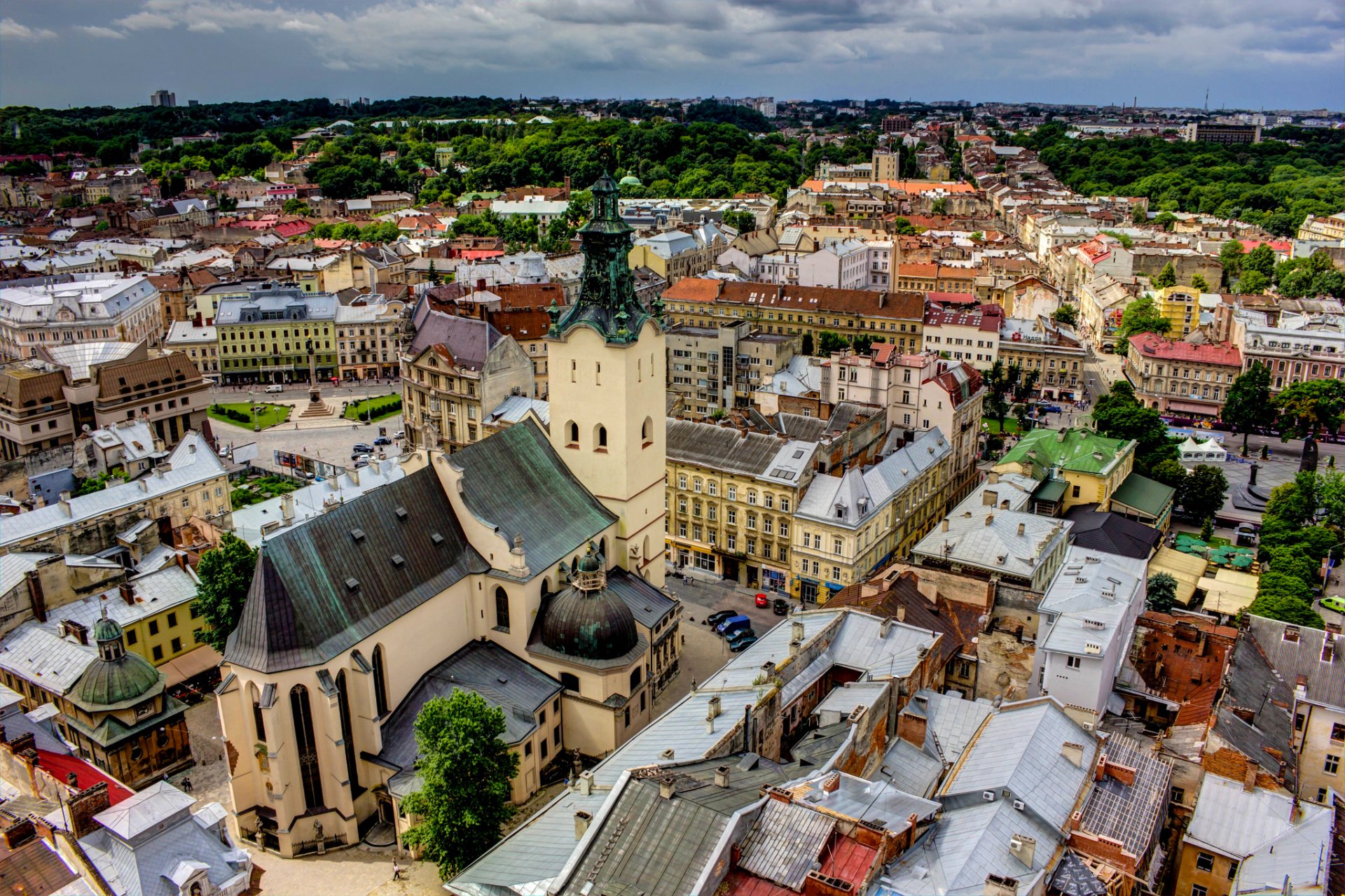 lviv lions ukraine latin cathedral architecture house roof buildings town panorama rain cloud