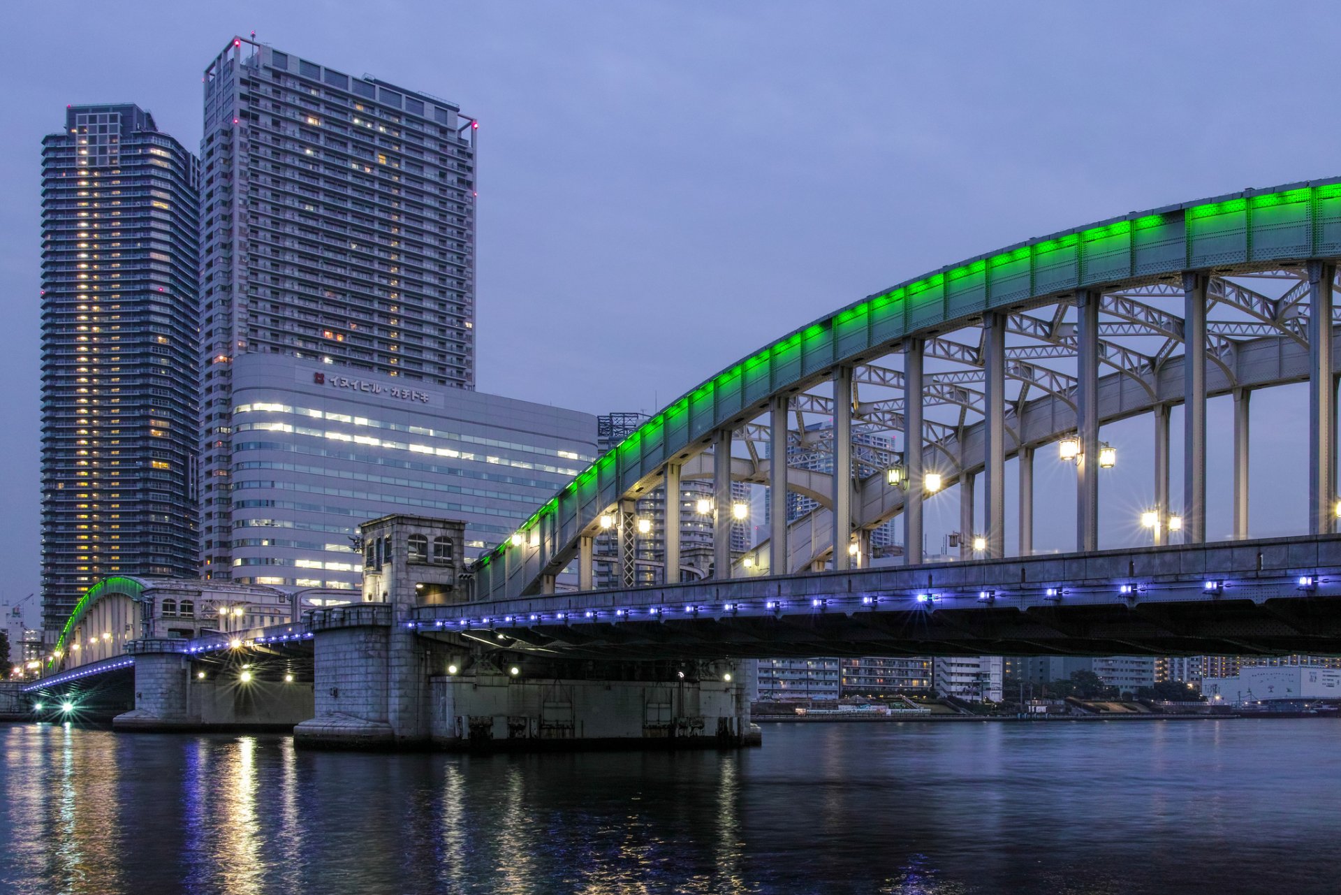 japan tokyo capital capital metropolis bridge green backlight lights lighting lanterns bay buildings evening lilac sky