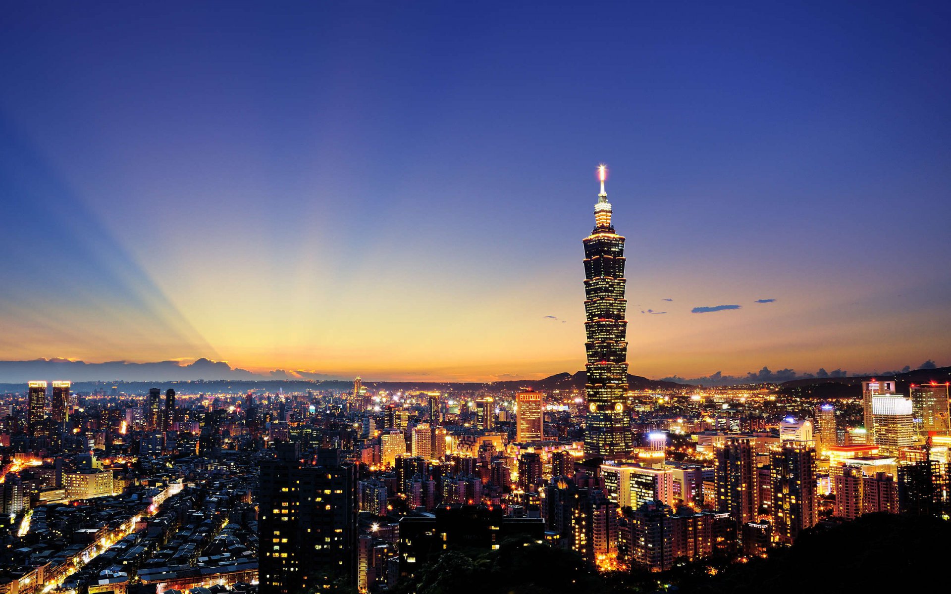 ciudad china taiwán taipei tarde puesta de sol cielo casa luces panorama