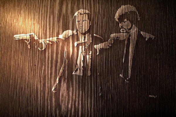 Dibujo en la pared con actores de Pulp Fiction