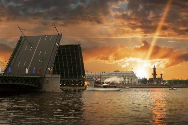 Drawbridge across the river at sunset