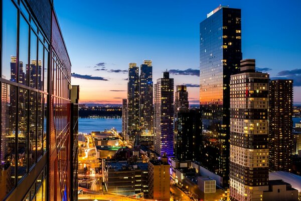 Lights of US skyscrapers at sunset