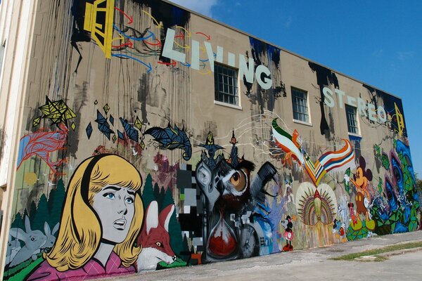 Edificio con grafiti multicolor representado en él