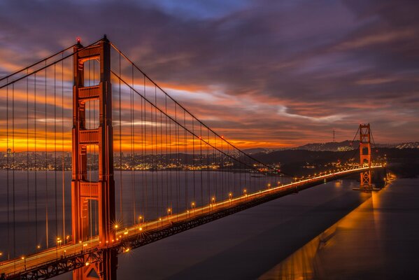 The image of the golden gate in the evening lights