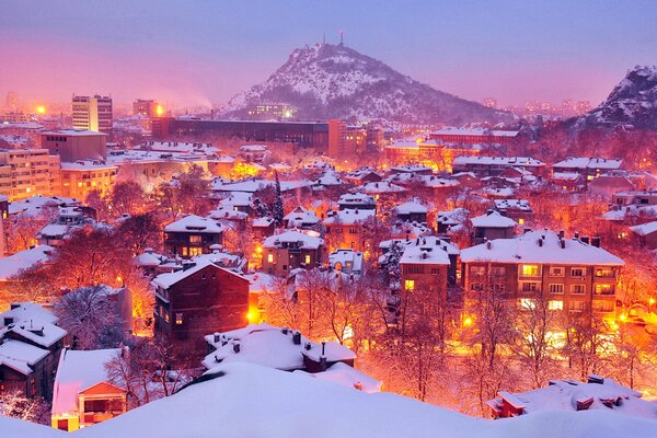 Evening and snow city in Bulgaria