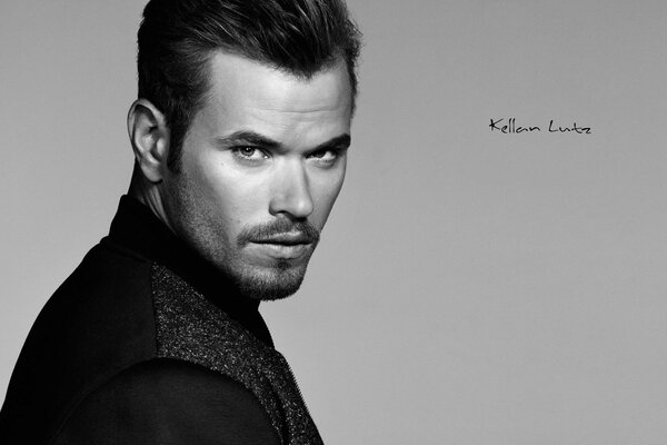 A handsome actor on a black and white background