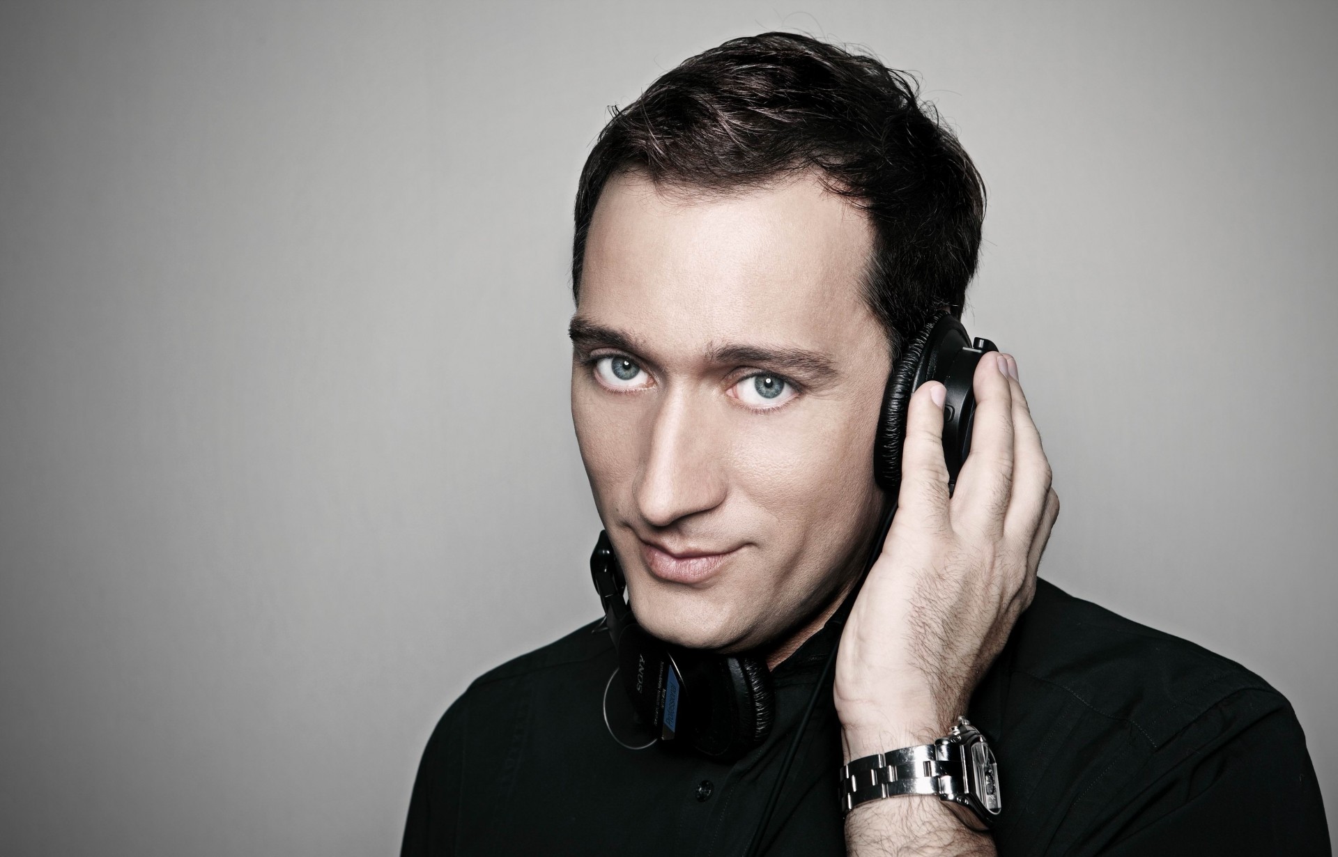 paul van dyk gray eyes gray background hand watches dj headphones sony