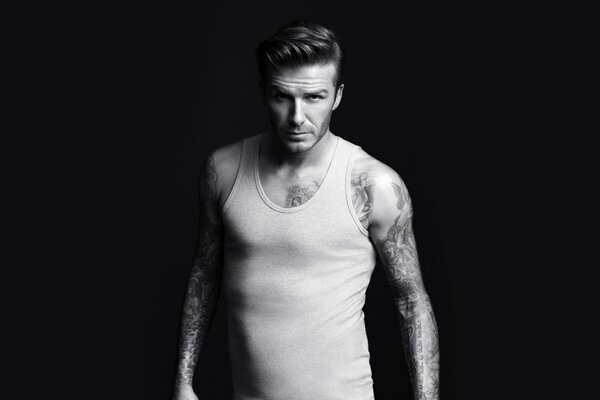 Sportler David Beckham, der sich mit Fußball beschäftigt