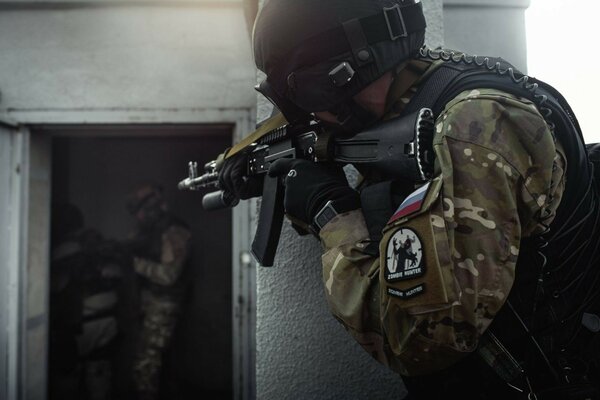 Russian special forces on a mission aim at the target