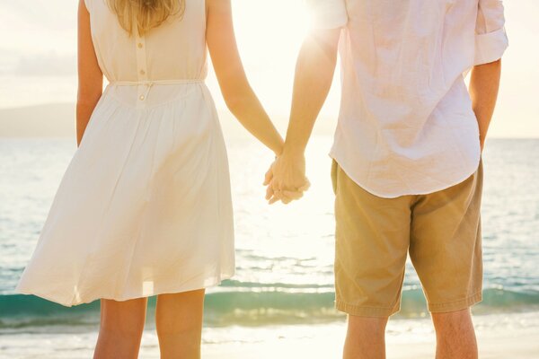 A man and a woman on a beautiful beach