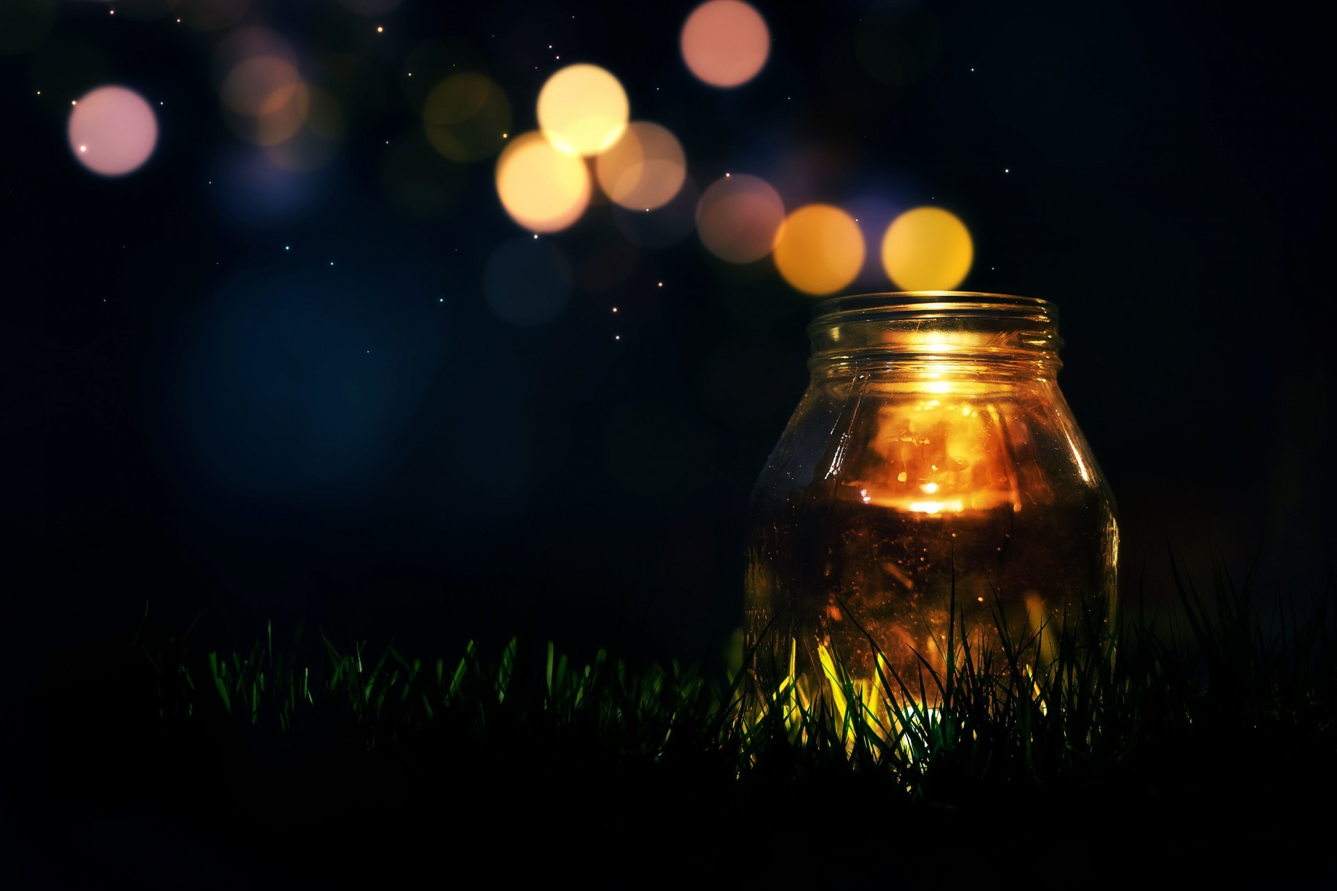 widescreen full screen green mood candle bokeh background light grass jar wallpaper sequin