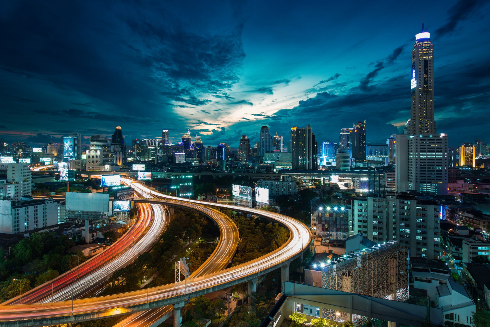 town buildings house skyscraper lighting road bridge motion extract night sky cloud