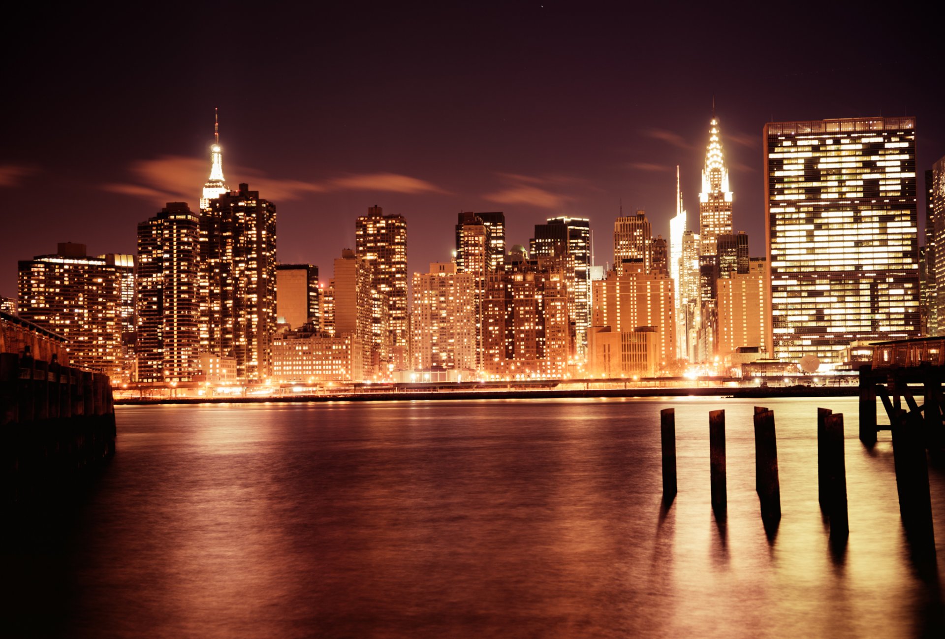 nueva york manhattan estados unidos rascacielos edificio chrysler empire state building empire state building ciudad noche luces rascacielos edificios casas río luz